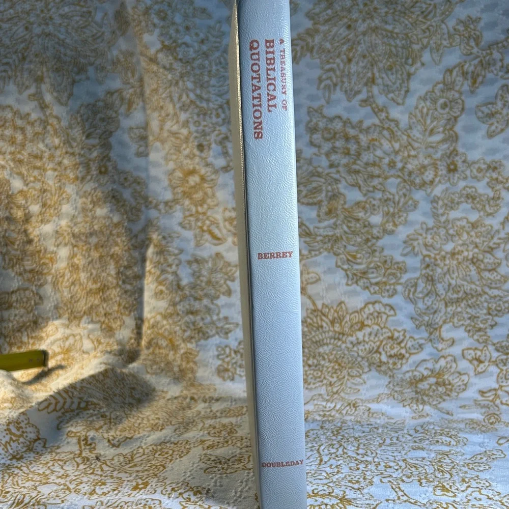 White Hardcover Book with Red Text - Picture 2 of 5